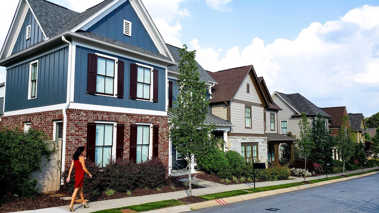 A Southern Maryland home with landscaped beds and lawn — where pest pressure begins in the surrounding landscape