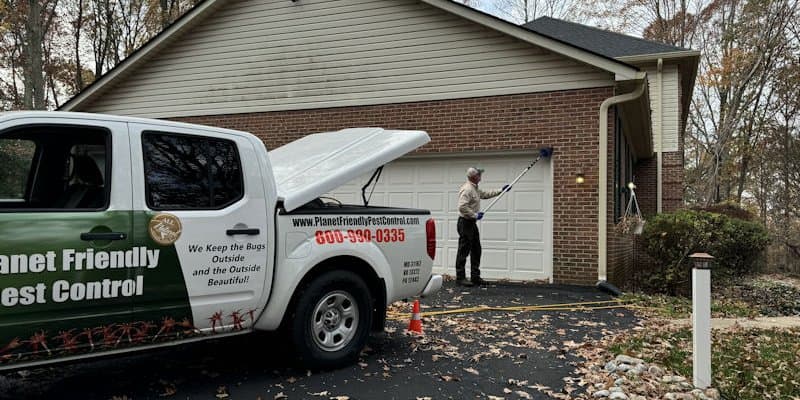 Client property exterior — tick protection starts at the yard edge and grass line