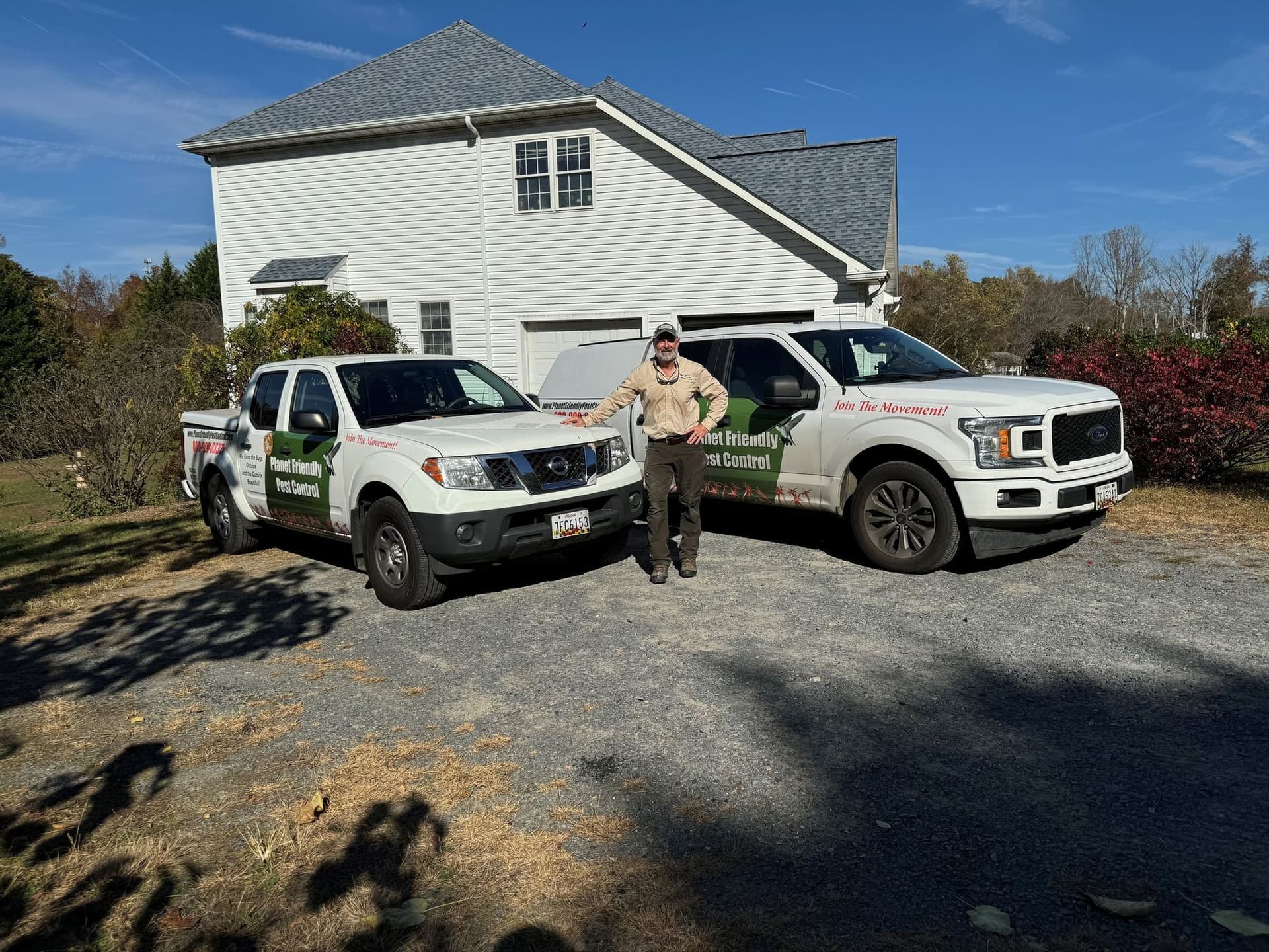 A Planet Friendly Pest Control technician performing an exterior treatment near Lexington Park MD
